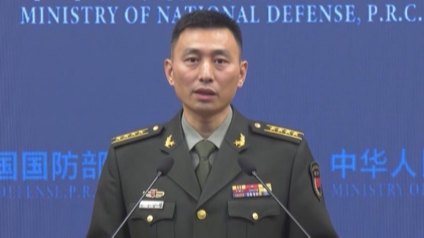 国防部现任发言人，展现新时代国防风采的发言人，国防新貌，新时代发言人的风采展现国防力量